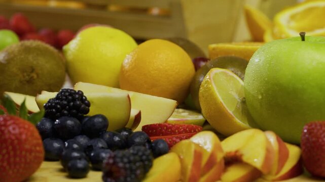 Extra closeup on delicious fruit scattered in kitchen
