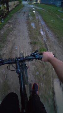 First Person View Cycling on Muddy Road