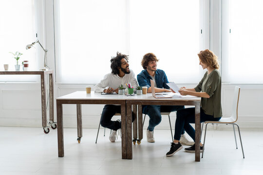 Young creative professionals working together in a cowrking space