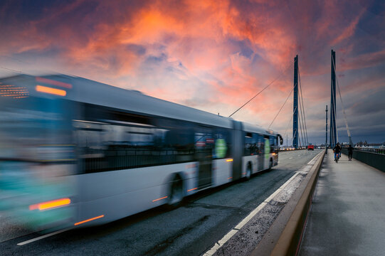 Germany, Nordrhein Westfalen, Dusseldorf, Bus crossing suspension bridge