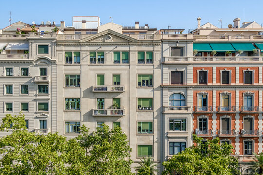Classical Residential Buildings Facade with Green Shutters, Barcelona
