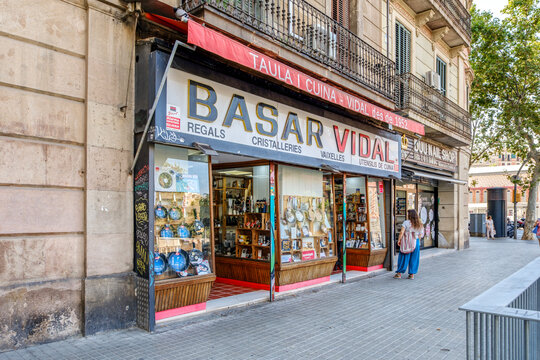 Traditional Kitchenware Shop Basar Vidal Storefront in Barcelona, Displaying Cookware, Glassware, Vintage Awning