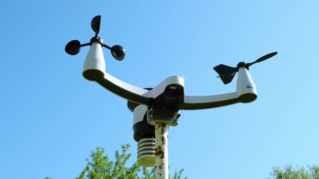 Modern wireless weather station. There are sensors of temperature and humidity, Wind speed and direction, Rain gauge and snow sensors. Solar panel. Meteorological equipment, smart home technology. 4K.