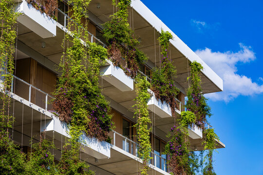 Modern ecological building with vertical garden in Stuttgart