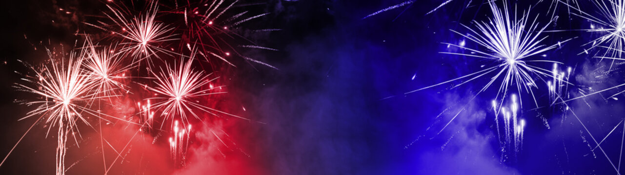 USA america united states new year, new years eve or Independence Day, 4th of July celebration holiday background banner panorama long greeting card - Blue red white firework on dark night sky