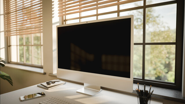 Computer Blank Screen Mockup in Sunlit Minimalist Home Office
