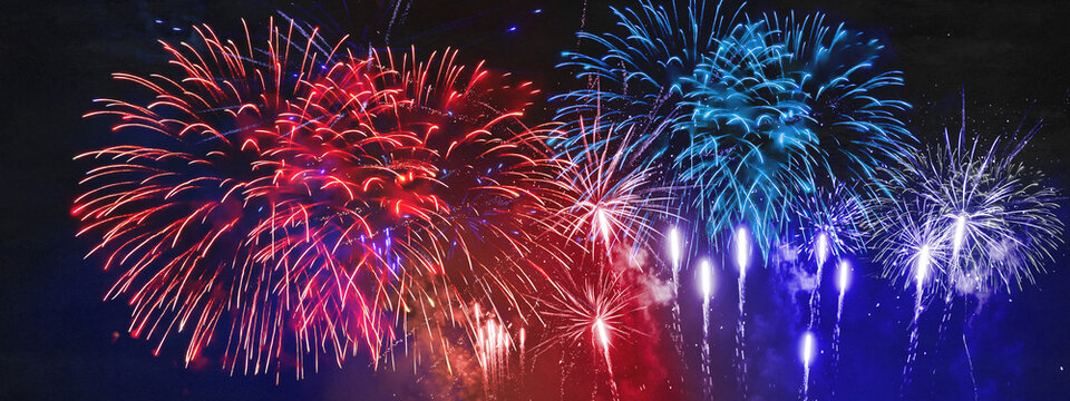 USA america united states new year, new years eve or Independence Day, 4th of July celebration holiday background banner panorama long greeting card - Blue red white firework on dark night sky