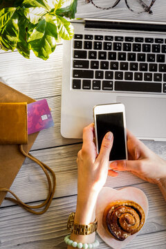 concept girl online shopping with laptop mock up top view