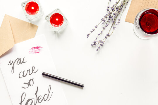 concept of Valentine Day love letter white background top view