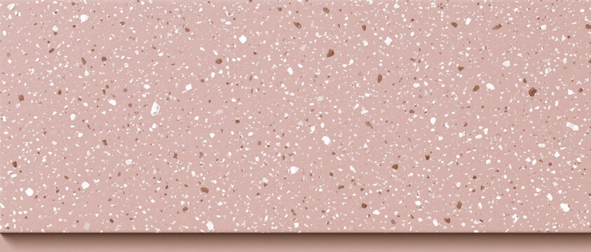 A smooth pink terrazzo surface with white and brown stone chips arranged in a modern pattern to create an elegant decorative texture for interior design backgrounds
