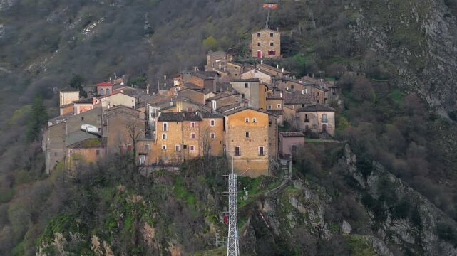 Aerial view of the historic stone buildings of Anversa degli Abruzzi perched on a rocky hillside in the Abruzzo region, Anversa degli Abruzzi, Abruzzo, Italy.
