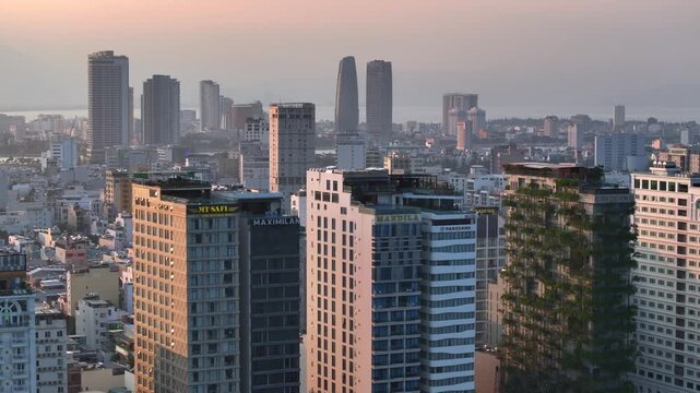 Da Nang coastal city at morning, cityscape with a long Beach, Crowded urban Coastline. Sea vacation, traveliving Vietnam