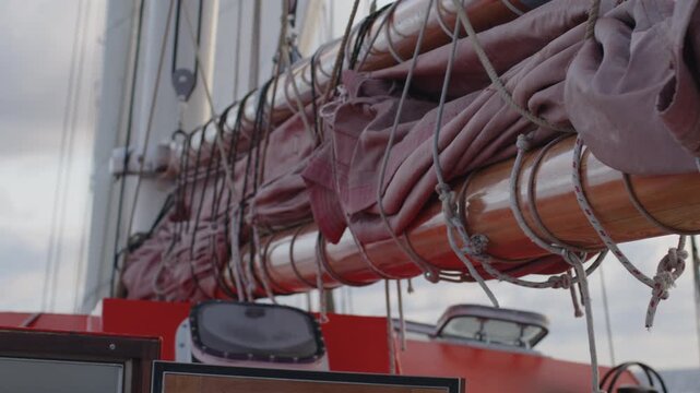 Sailing boat moves in the Atlantic Ocean, details of the vessel