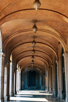 Old portico along the Sentierone, historic street in Bergamo, Italy