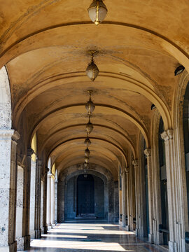 Old portico along the Sentierone, historic street in Bergamo, Italy