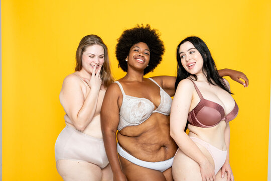 Diverse women embracing body positivity.