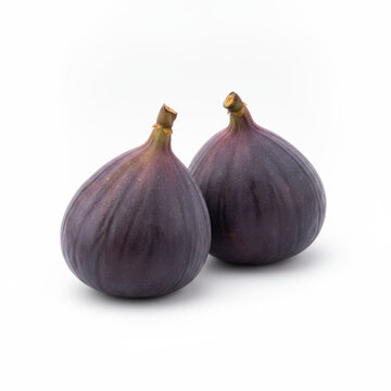 Two fresh purple figs on white background