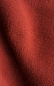 Texture of fleece fabric and its inner or back side, background or backing. Clothing, sewing. Faux fur. Background with fur structure.	