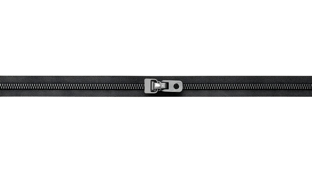 A close up of a black plastic zipper with a silver metal slider on a black background