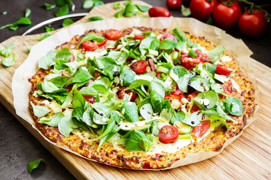 Low Carb Zucchini and Carrot Crust with Mozzarella Tomatoes and Lamb's Lettuce
