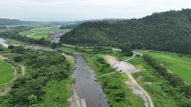 Aerial View of the Clear Adogawa River near Adogawa Riverside Campsite, Shiga Prefecture, Japan &ndash; Summer Freshwater Landscape with Two Weirs