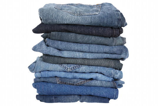 Neatly Folded Pile of Denim Jeans in Various Blue Washes