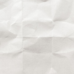 Fototapeta na wymiar Crumpled white paper texture with visible folds and creases.