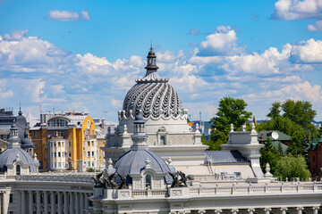 Ornate lattice dome of historic palace against city skyline, Kazan © Mariia