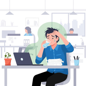 Overworked Businessman Feeling Stressed And Dehydrated At His Desk