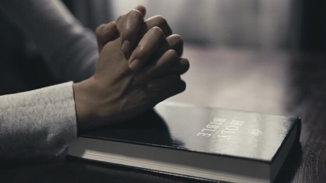 A person praying alone in a peaceful space, expressing devotion, faith, worship, hope, and a strong spiritual connection.