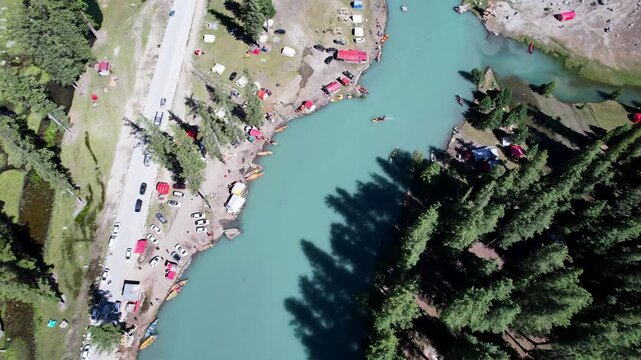 Top-down view of campsites beside Mahodand Lake in Upper Ushu Valley, Khyber Pakhtunkhwa, Pakistan