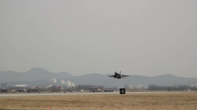 F-16 Combat Jet Launching into the Sky During Military Exercise