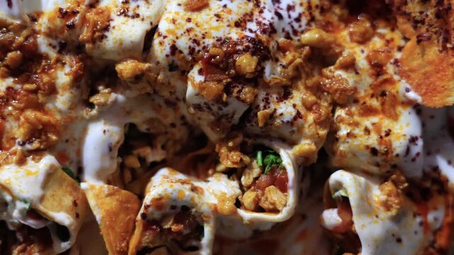 Close-up of traditional Turkish yogurt tantuni with melted butter sauce