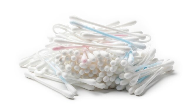 Pile of cotton swabs with white, blue, and pink tips on a white background, representing hygiene and personal care products