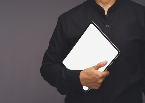Person holding blank tablet mockup for presentation
