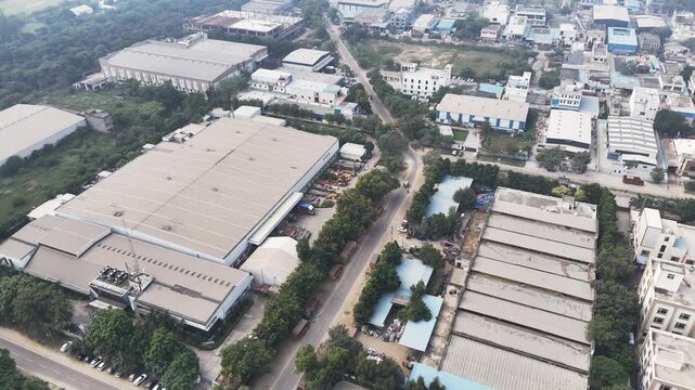 Aerial view of industrial warehouses and factories in Noida, Uttar Pradesh, India.