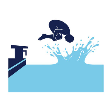 Person diving into swimming pool water from diving board