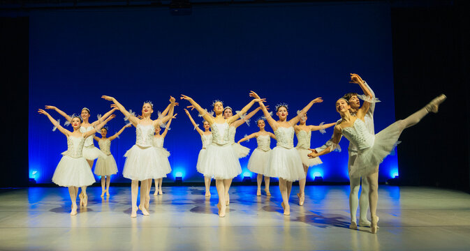 Ballet dancers perform a scene from a classical holiday ballet