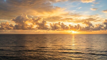 Obraz premium Breathtaking Golden Sunset Over Calm Ocean Horizon With Dramatic Clouds And Sunlight Reflection