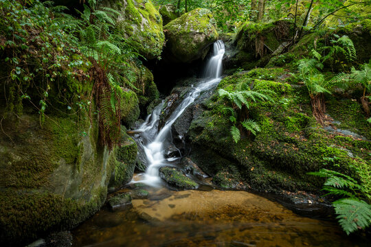 Idyllic waterfalls on the River Edo in Castro Caldelas, Ourense, Galicia, Spain