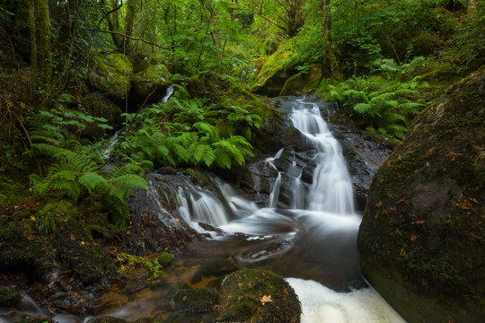 Idyllic waterfalls on the River Edo in Castro Caldelas, Ourense, Galicia, Spain