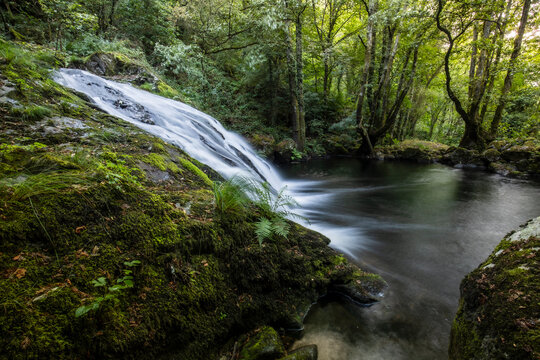 Idyllic waterfalls on the River Edo in Castro Caldelas, Ourense, Galicia, Spain