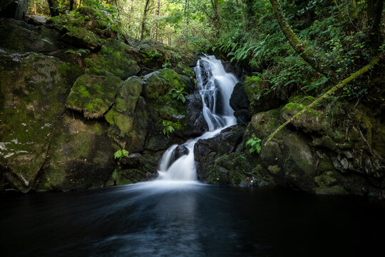 Idyllic waterfalls on the River Edo in Castro Caldelas, Ourense, Galicia, Spain