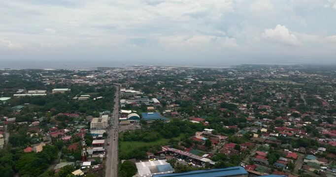 Aerial drone of city of Bacolod by the sea. Negros Occidental, Philippines.