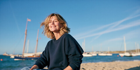 Fototapeta premium Womens health woman smiling by marina on sunny beach