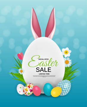 Festive easter egg with bunny ears and spring flowers on a teal background