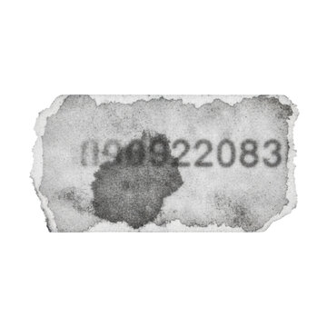 Weathered grey paper strip with jagged torn edges, charcoal smudges, and industrial markings isolated on white background, minimalist industrial decay atmosphere