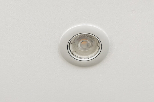 Recessed ceiling light fixture with a modern metallic finish and bright illumination