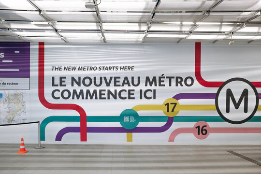Paris, France - January 28, 2026: Promotional wall for the Grand Paris Express metro network inside the Metro Line 14 station serving Paris Orly Airport.