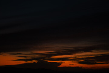 Fototapeta premium Dramatic Dark Sunset Sky with Clouds